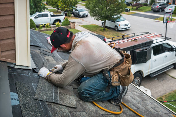 Professional Hail Damage Roof Repair technician working in Marcy, NY
